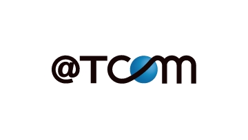 @TCOMのロゴ